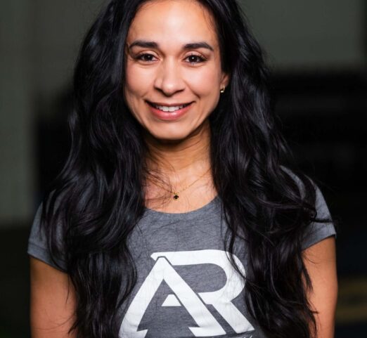 A headshot of Coach Veronica